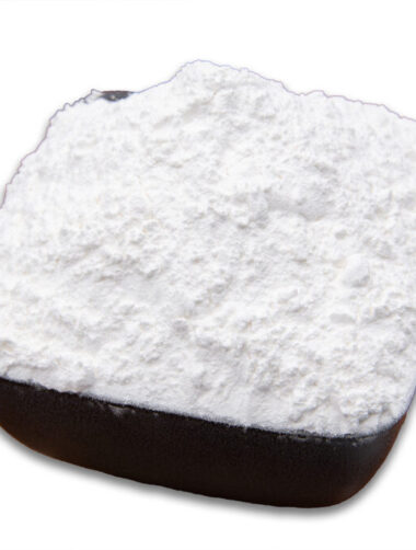 A white bowl filled with corn starch, showcasing its fine texture and pure white color