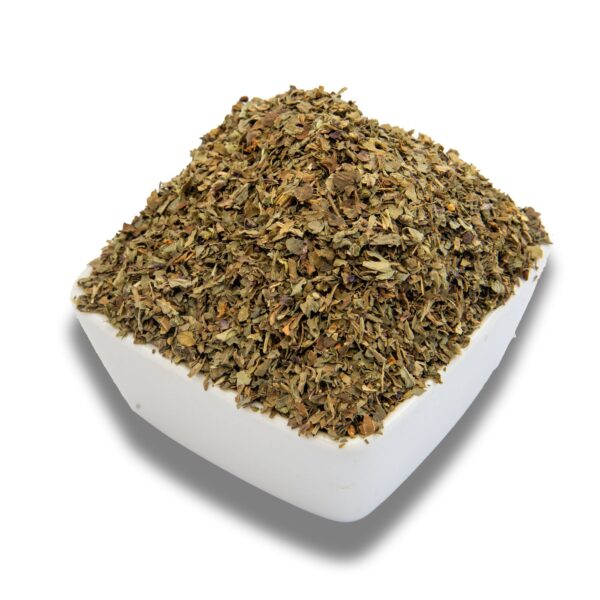 A bowl filled with dried basil leaves, showcasing their texture and color.