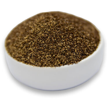 Aromatic ground black pepper in a bowl, perfect for everyday seasoning and culinary use.
